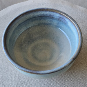 Set of 2 small bowls made of terra red ceramic. Glazed a subtle blue opal.