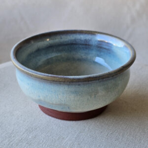 Set of 2 small bowls made of terra red ceramic. Glazed a subtle blue opal.