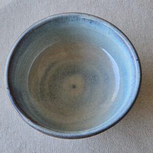 Set of 2 small bowls made of terra red ceramic. Glazed a subtle blue opal.