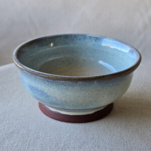 Set of 2 small bowls made of terra red ceramic. Glazed a subtle blue opal.