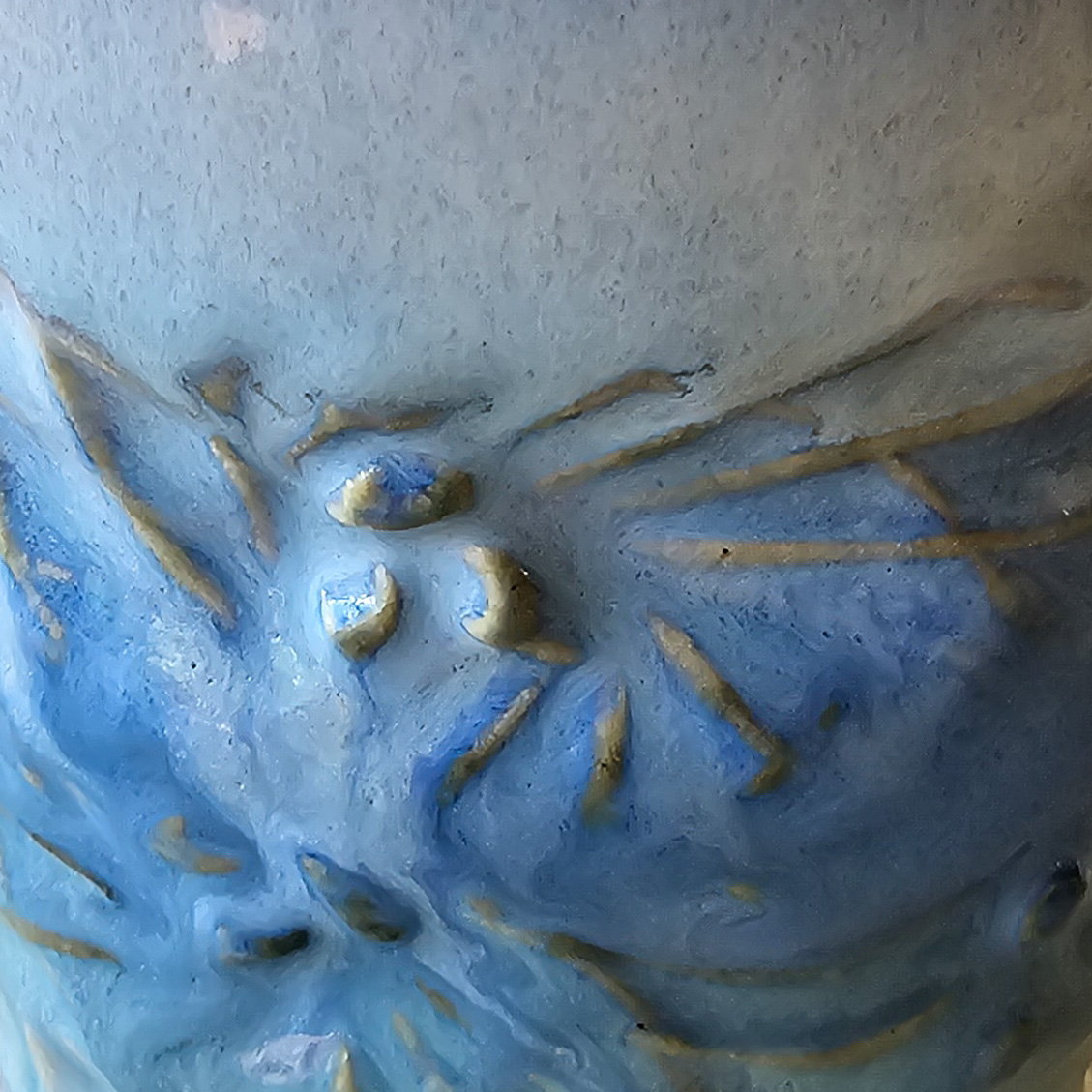 close up shot of blue glazed mug with texture